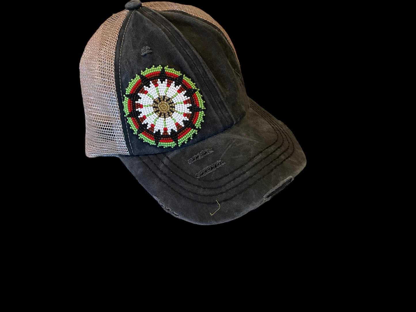 Black criss-cross ponytail cap with beaded patch