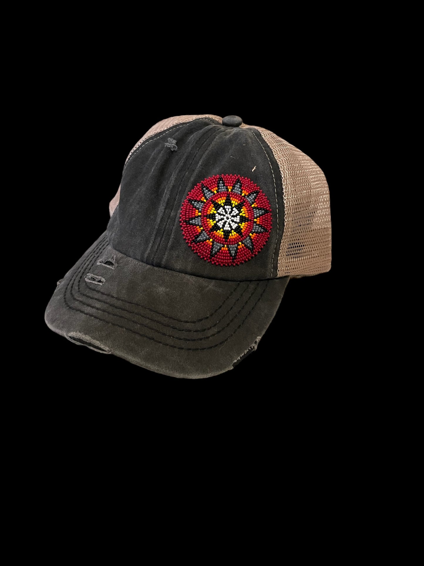 Black criss-cross ponytail cap with beaded patch