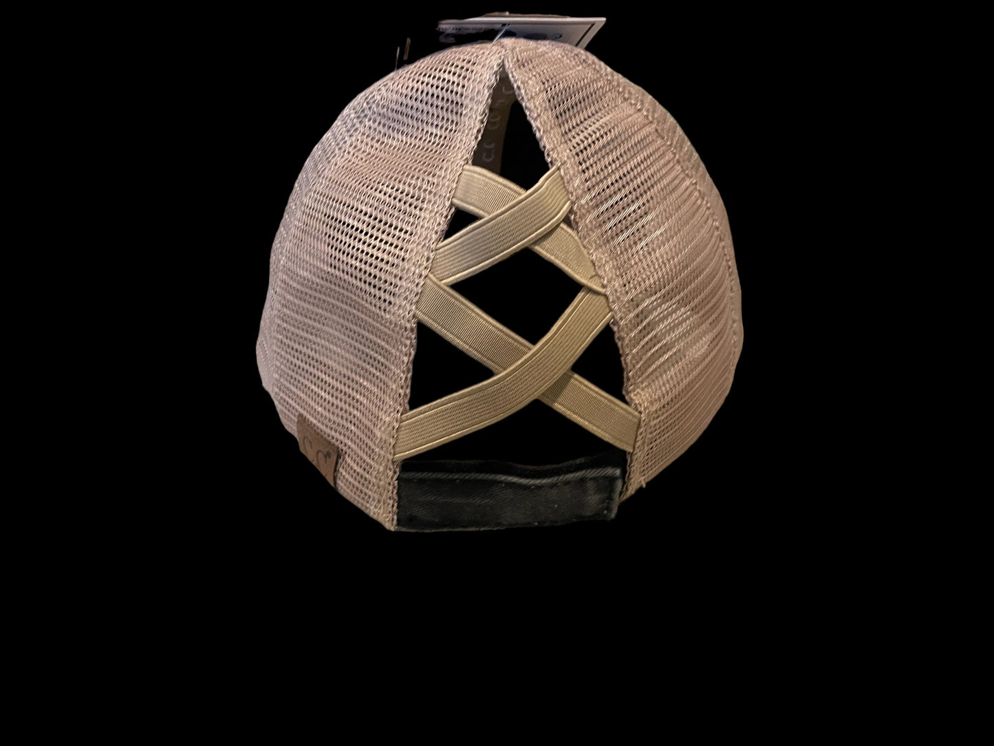 Black criss-cross ponytail cap with beaded patch